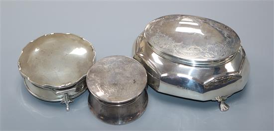 Three assorted early 20th century silver trinket boxes, including one with engraved lid, largest 13.5cm.